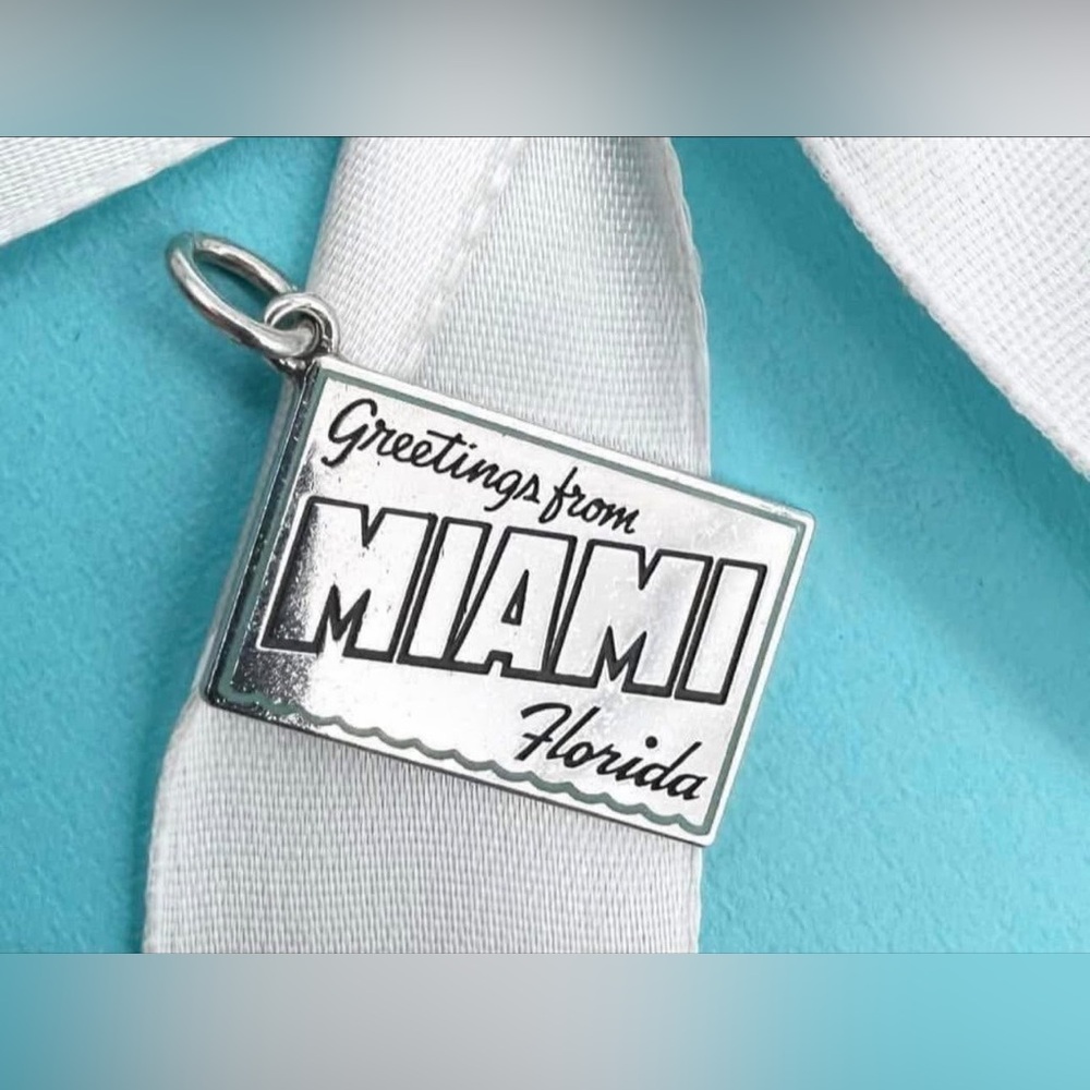 Tiffany & Co Vguc Miami post card charm in sterling silver